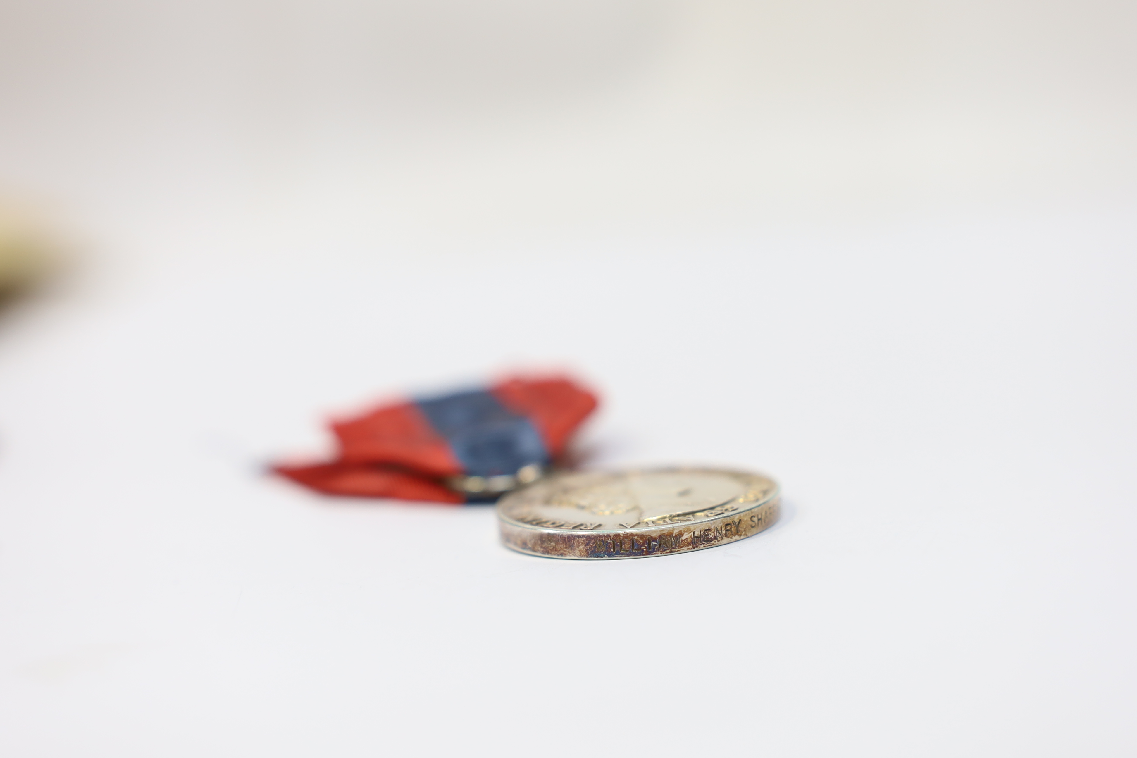 Four assorted Service medals; Vict unnamed Volunteer Long Service medal; GV Colonial Auxiliary Forces Long Service medal (disc only) to E.S.Ware; ERII ISM to Thomas Edward Downes; ERII ISM to William Henry Sharratt. Cond